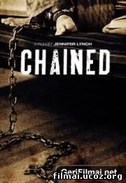 Ant grandinės / Chained